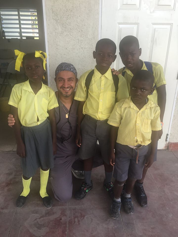 Dr. Reza Khazaie with beautiful kids in Haiti
